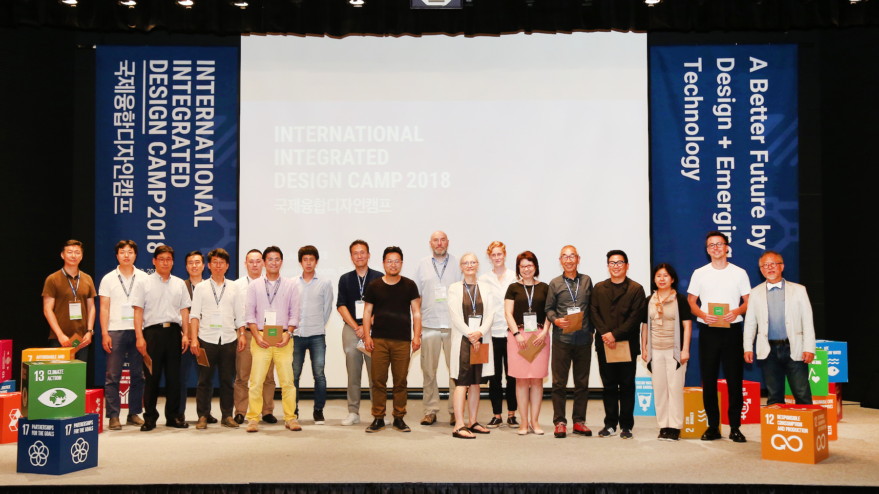 KIDP-IIDC 2018 Day 3 - 180 tutors on stage b.jpg